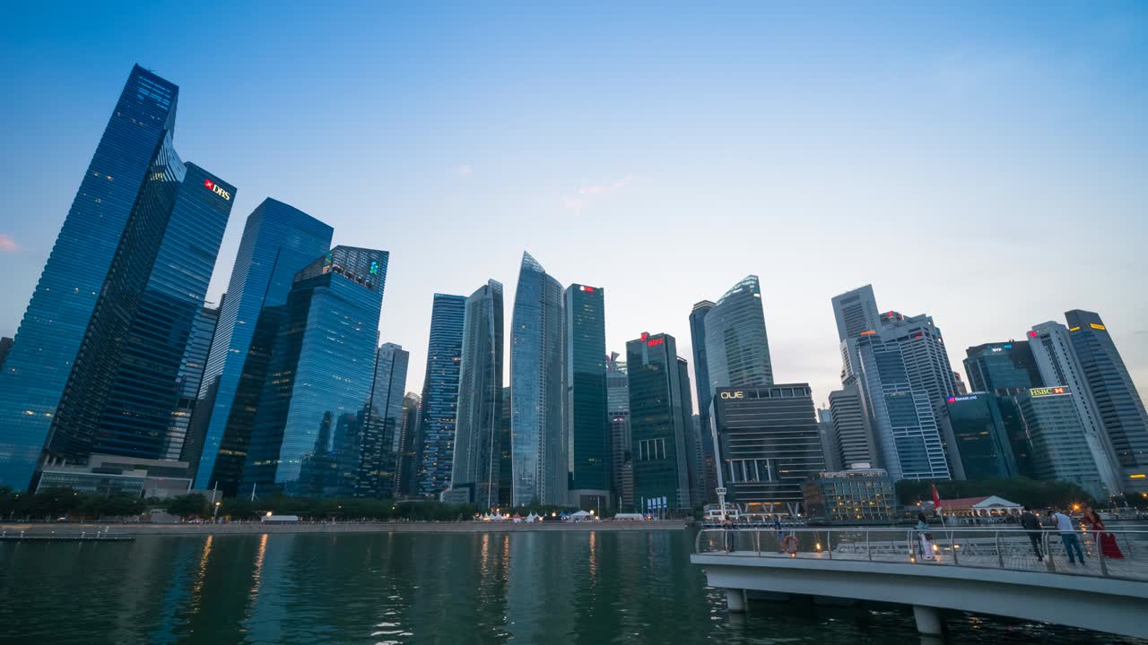 day to night Time-lapse of Singapore Skyline and view of skyscrapers on Marina Bay