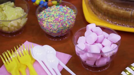 birthday party dessert bar with cake decorations