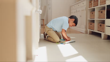 art, education and child on floor in home