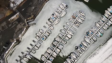 top down shot of frozen marina during winter at lighthouse landing in grand rivers, kentucky