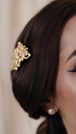 elegant gold hairpiece styled on dark hair