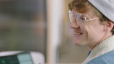 close-up-portrait-attractive-young-caucasian-man-student-smiling-happy-entrepreneur-enjoying-successful-career-in-trendy-startup-office