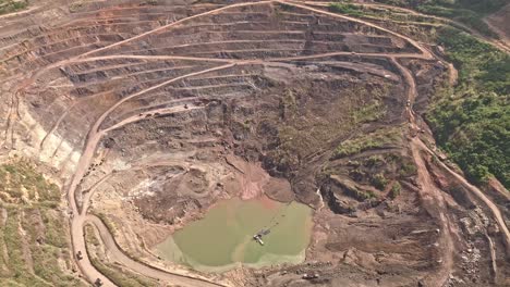 Slow-Zoom-Out-Aerial-View-of-Siana-Glod-and-Silver-mine,-Mainit,-Philippines