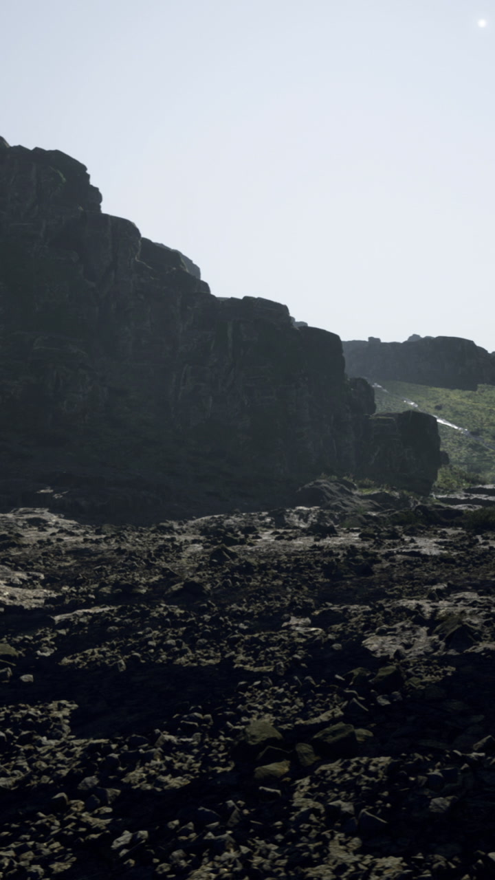 Rocky landscape near hills during bright daylight hours in nature