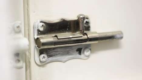 locking a door correctly with a simple latch on a closer view