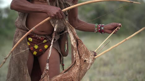A-native-man-placing-an-arrow-into-his-bow
