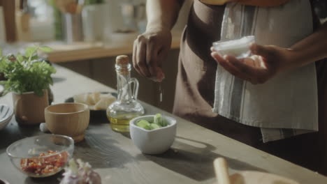 person preparing food in a kitchen