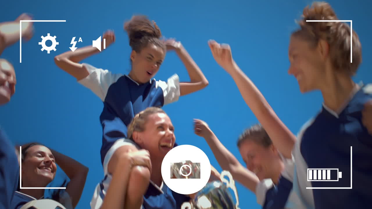 tomar fotos de futbolistas femeninas en una cámara digital