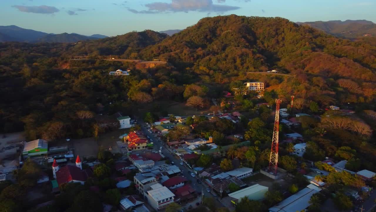Aerial over Samara Beach and town in the Guanacaste Province, Costa Rica. Drone orbit shot
