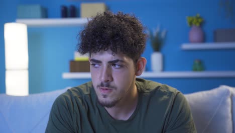 Close-up-portrait-of-frustrated-young-man.