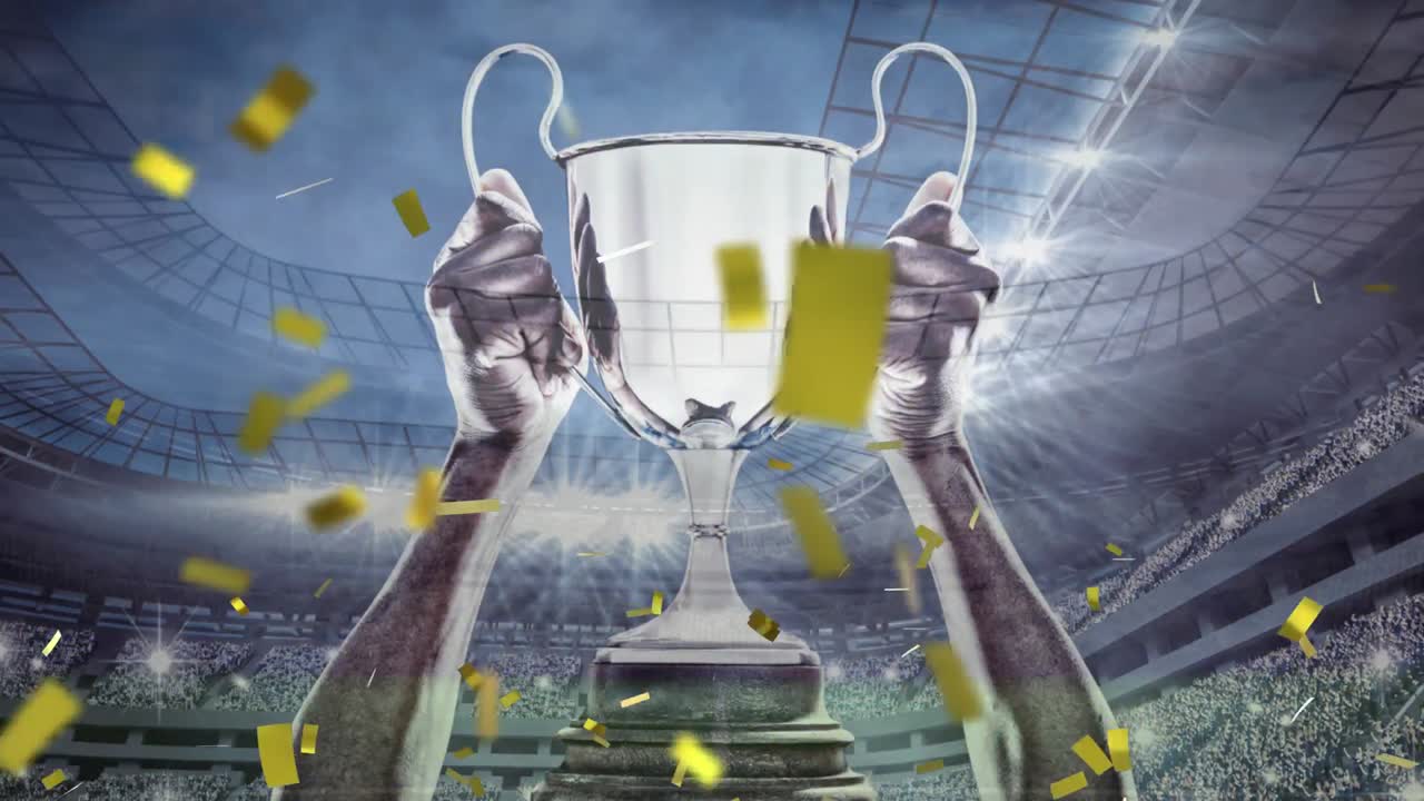 trofeo y confeti en un estadio