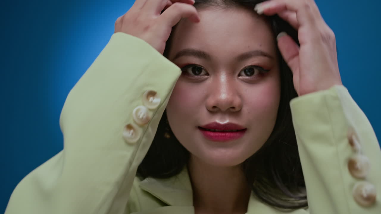 Asian Female Zoomer Isolated on Neon Blue