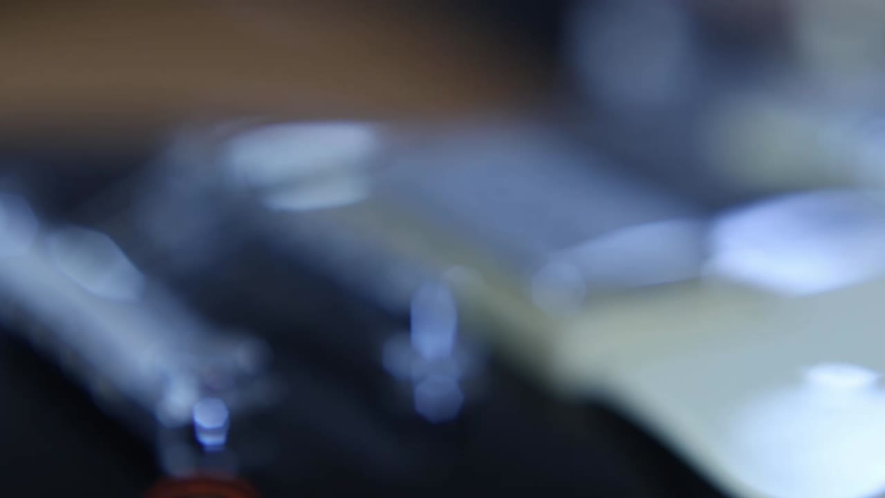 Close up pan of guitar body