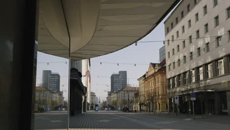 wide angle shoot of an empty main street and bus station in ljubljana