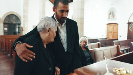 funeral, coffin and man hug mother in church