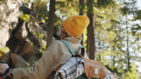 senior woman hiking in the woods