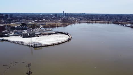 drone circling over the ottawa river showing a hydro electric dam