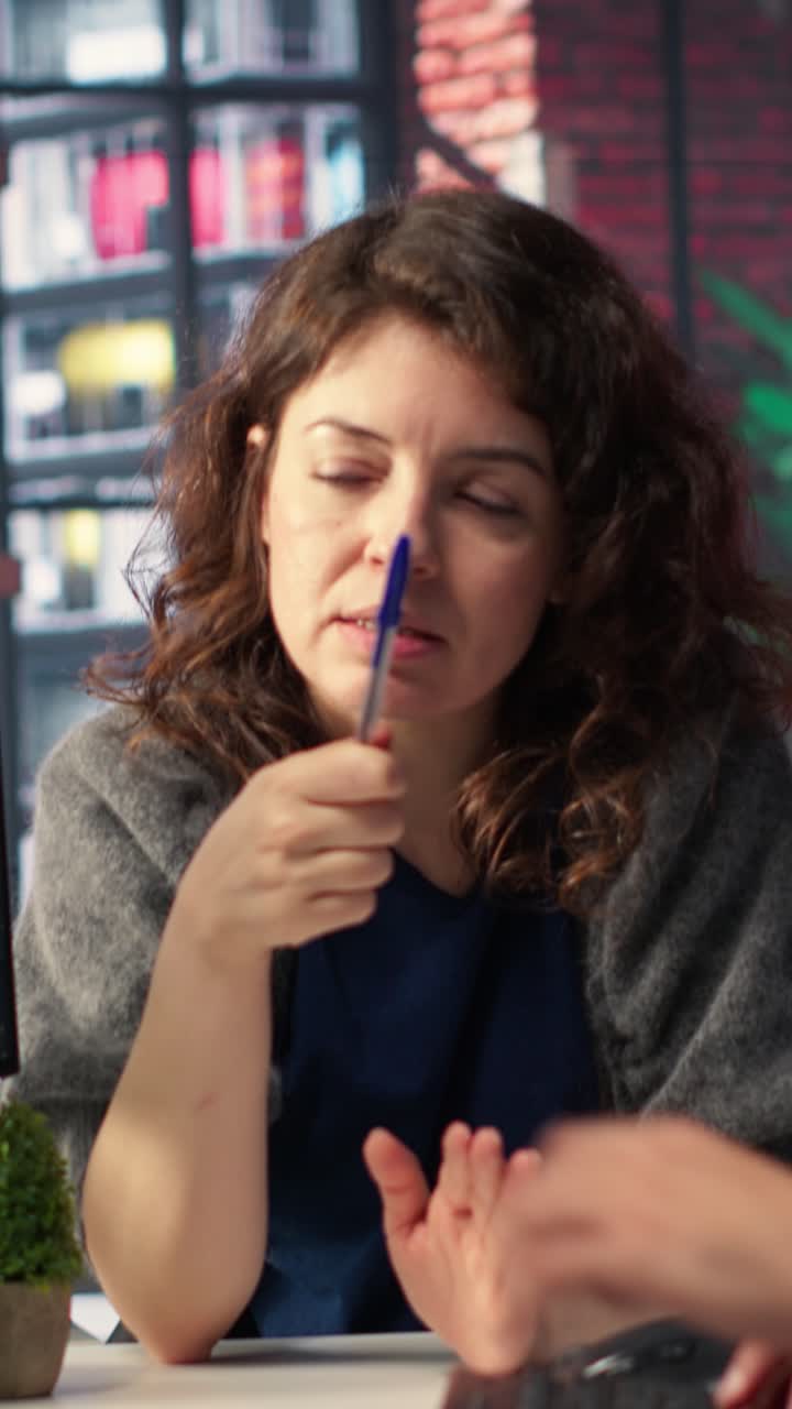 Vertical Video Creative team work with AI chatbot and editing software to improve content