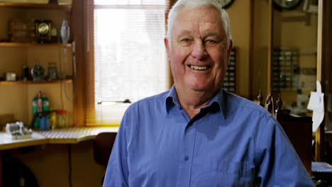 portrait of smiling horologist