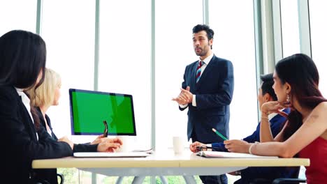 Business-people-in-the-conference-room-with-green-screen