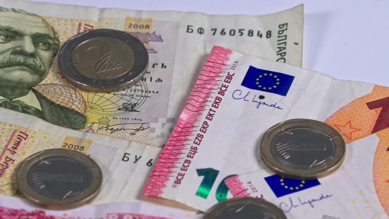 Banknotes and coins on table in a financial setting