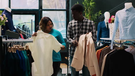 couple looking at trendy clothes