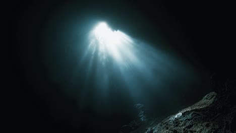 light hole in a cave in indonesia