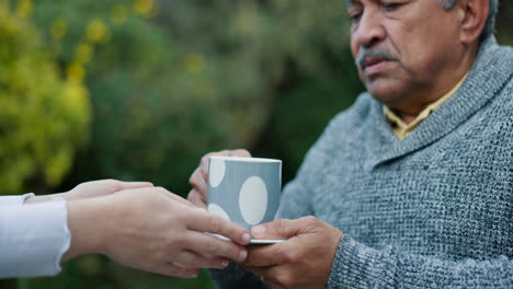 Senior,-man-and-drinking-coffee-in-garden