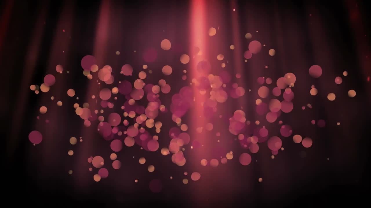 Luces rojas con efecto de burbujas sobre un fondo oscuro