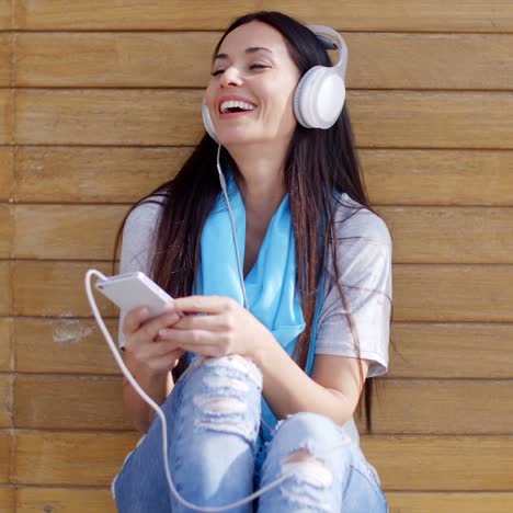 happy woman enjoying her music