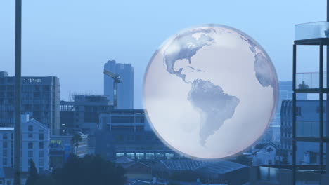 animation of globe over blue cityscape