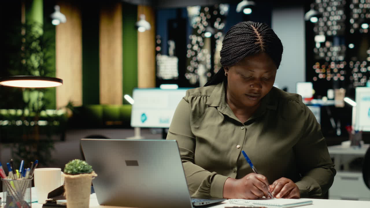 Businesswoman hosting international video call with executive board members