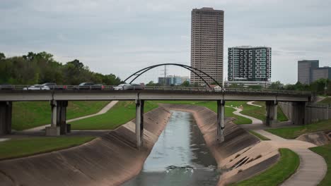 this video is about a time lapse of cars going over the buffalo bayou on bridge in houston, texas