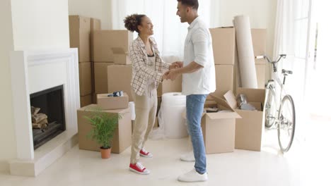 Happy-young-couple-congratulating-each-other