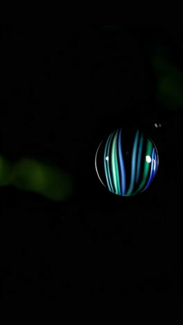 colorful marble in dark background