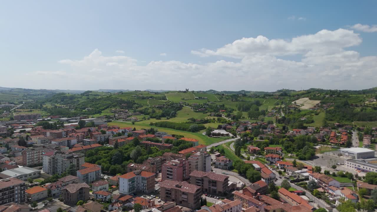 Nizza Monferrato, UNESCO site, Asti, Piedmont, Italy. 4k aerial view of the city. Langhe-Roero and Monferrato. Flying forward above the city and natural landscape.