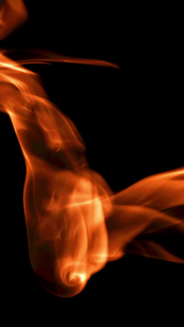 Abstract Orange and Yellow Flowing Fire and Smoke on Black Background