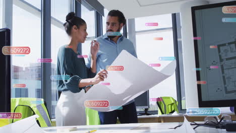 Discussing architectural plans, colleagues analyzing data with processing animation overlay