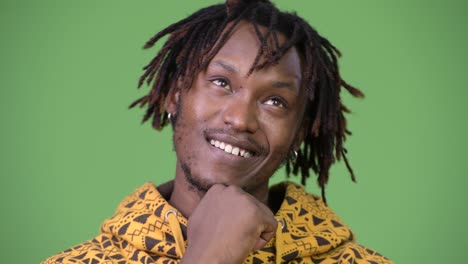 young handsome african man thinking