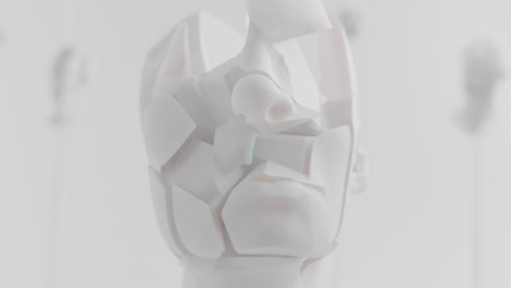 destroyed android head on spike in white space