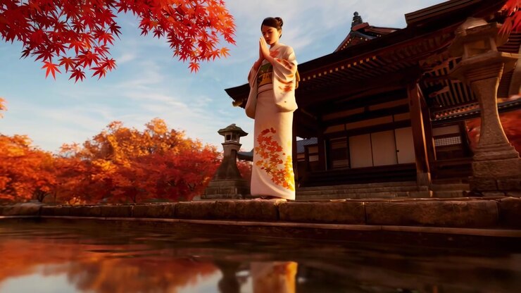 Donna giapponese in kimono che prega in un tempio tradizionale in autunno.