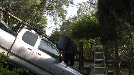 crashed truck with workers still working