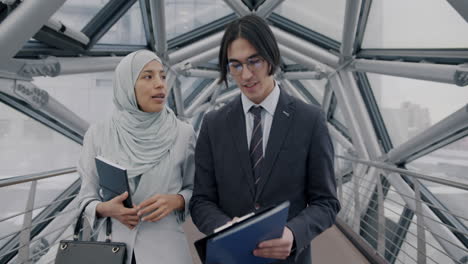 business colleagues discussing on a modern bridge