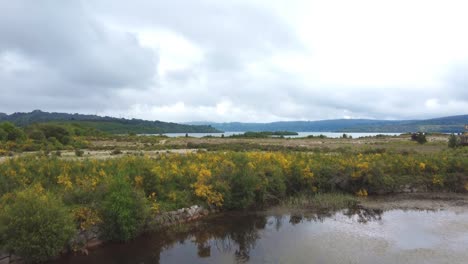 Drone-footage-in-As-Pontes-de-García-Rodríguez-Lake---Galicia---Spain