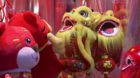 chinese new year decorative ornaments, such as yellow lions, seen for sale at a shop ahead of the lunar chinese new year in hong kong