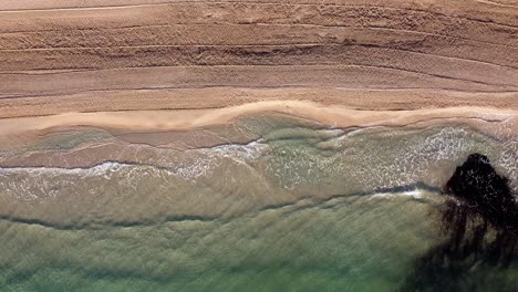 sea shore or seashore waves crashing by the seashore