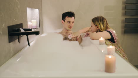 couple relaxing in a bubble bath