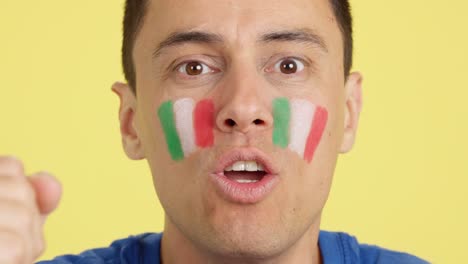 close up of a man supporting italian team