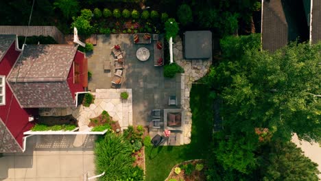 top down drone shot of an exterior patio seating area on a summer day