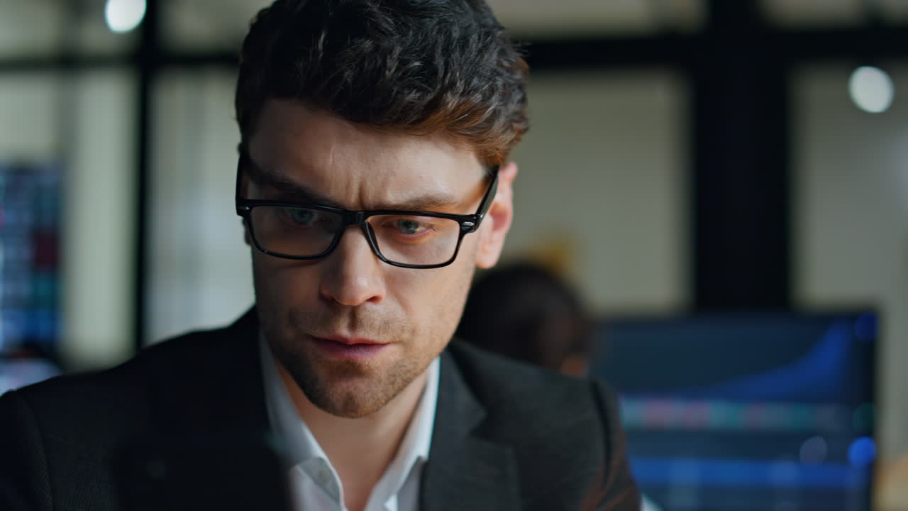 Late businessman thinking problem solution closeup. Serious man trader checking